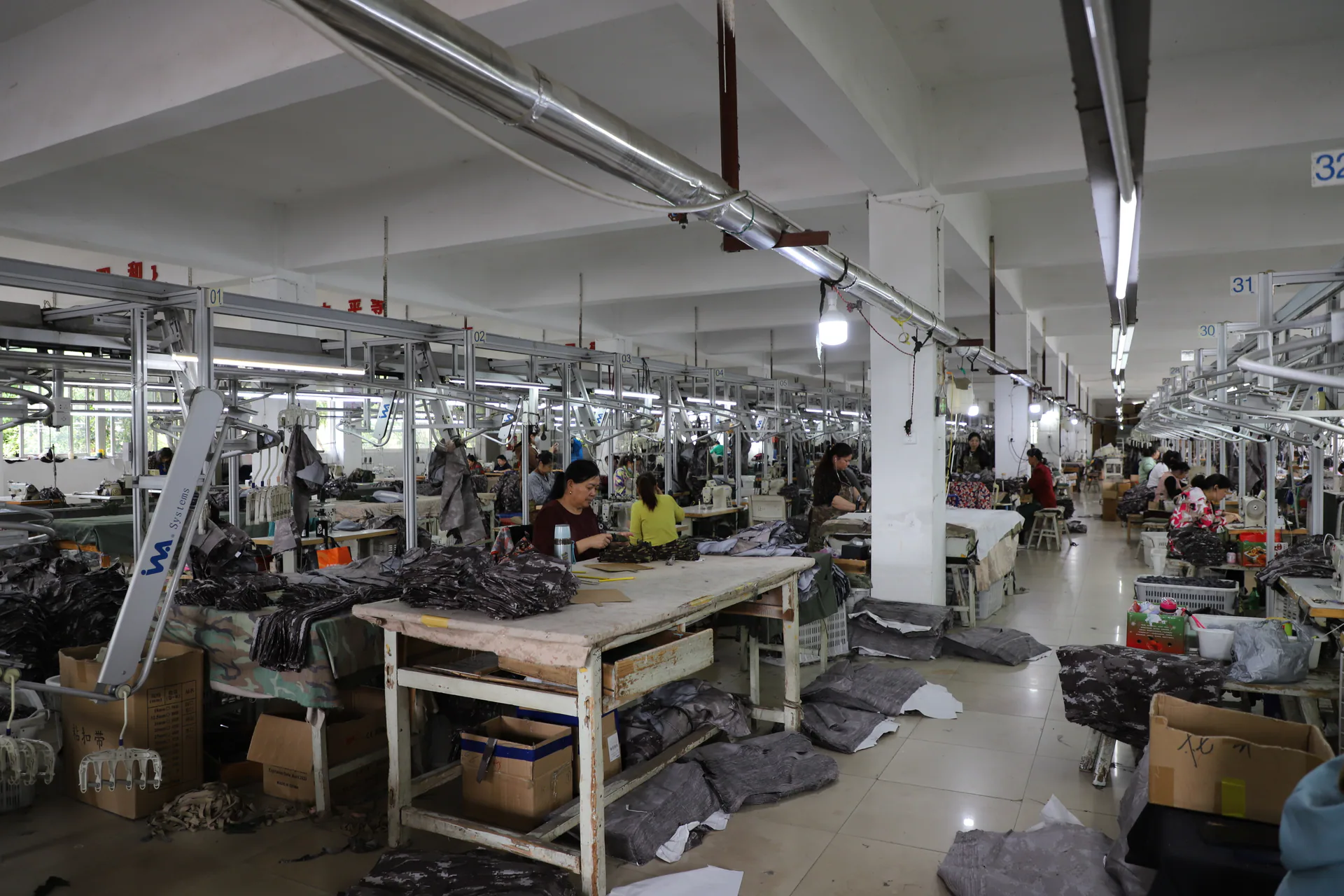 Wuhan Jinteng garment sewing line with an overhead hanger system